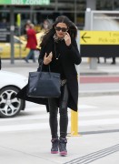 Jessica Gomes arrives into Melbourne airport - Leather Celebrities